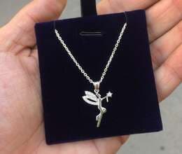 Gümüş boyunbağı